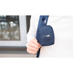 A Person holding a Fletcher Recycled rPET Mini Pouch Bag Charm