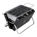 Portable grill with metal grid on a white background