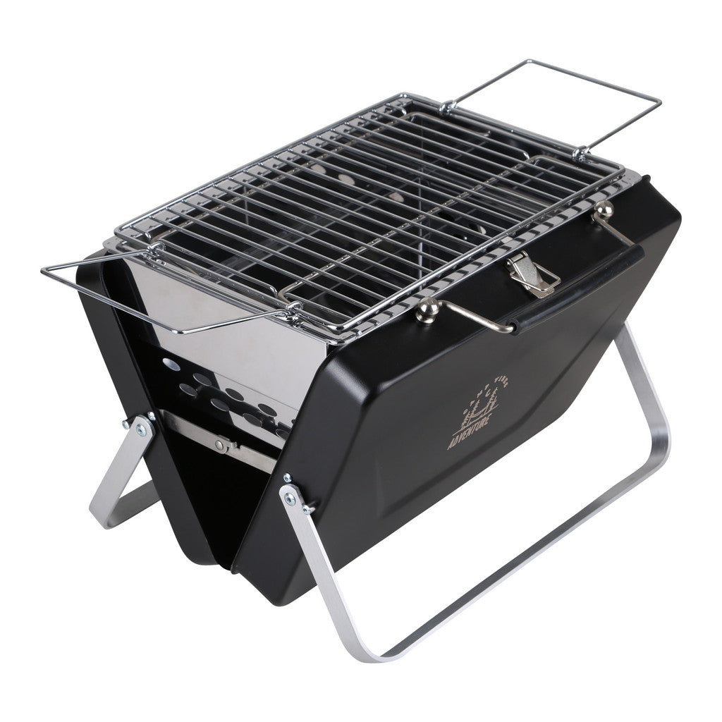 Portable grill with metal grid on a white background