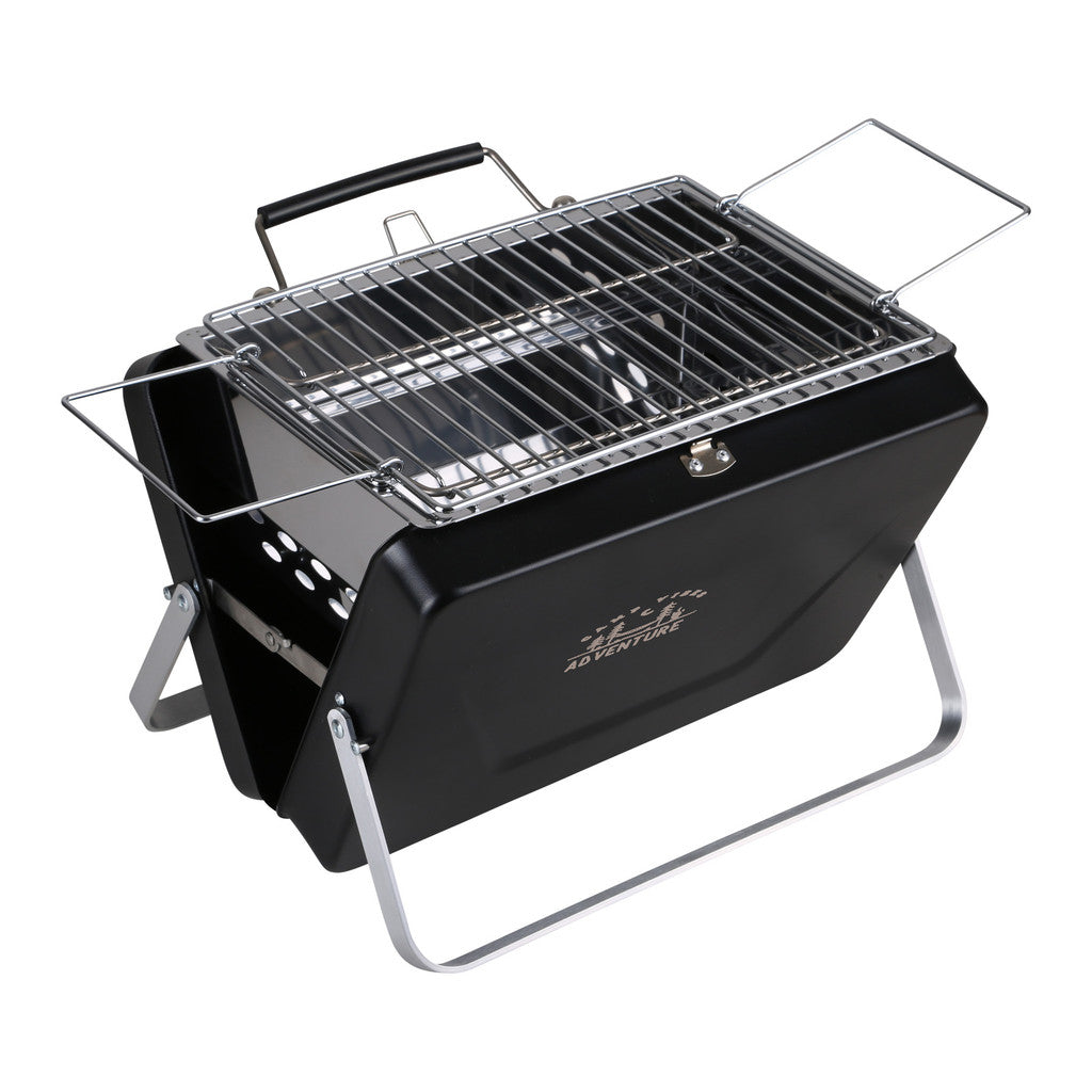 Black portable grill with metal grate on a white background
