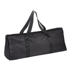 Black duffel bag with straps on a white background