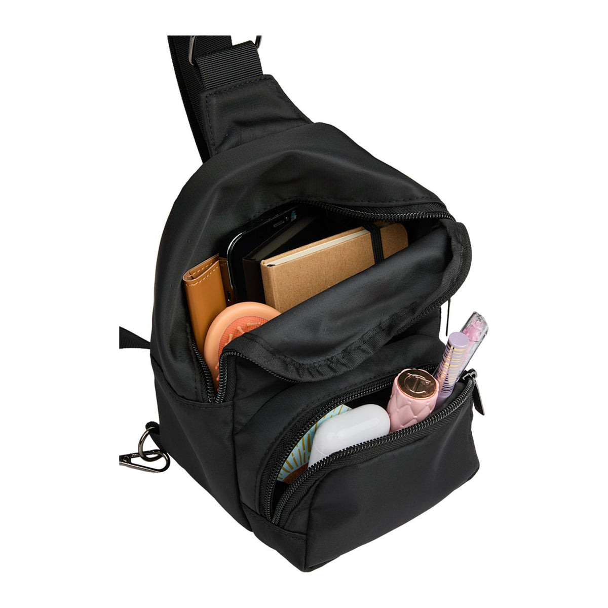 Daybreak Travel Sling shown full of non included items