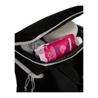 Black Glacial Recycled 15L Backpack Cooler shown opened with contents inside