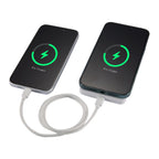 two smartphones shown charging beside MI Power 5000 mAh MagClick™ 15W Wireless Power Bank