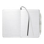 Open notebook with lined pages and a pen on a white background