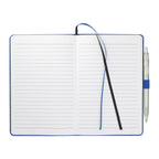Open notebook with lined pages and a pen on a white background