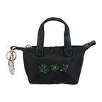 Black Mini Fontaine Tote Charm with a custom logo