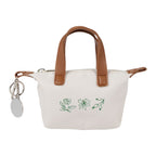 Natural Mini Fontaine Tote Charm with a custom logo
