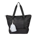 Gray Mini Daybreak Backpack Charm shown on a tote bag
