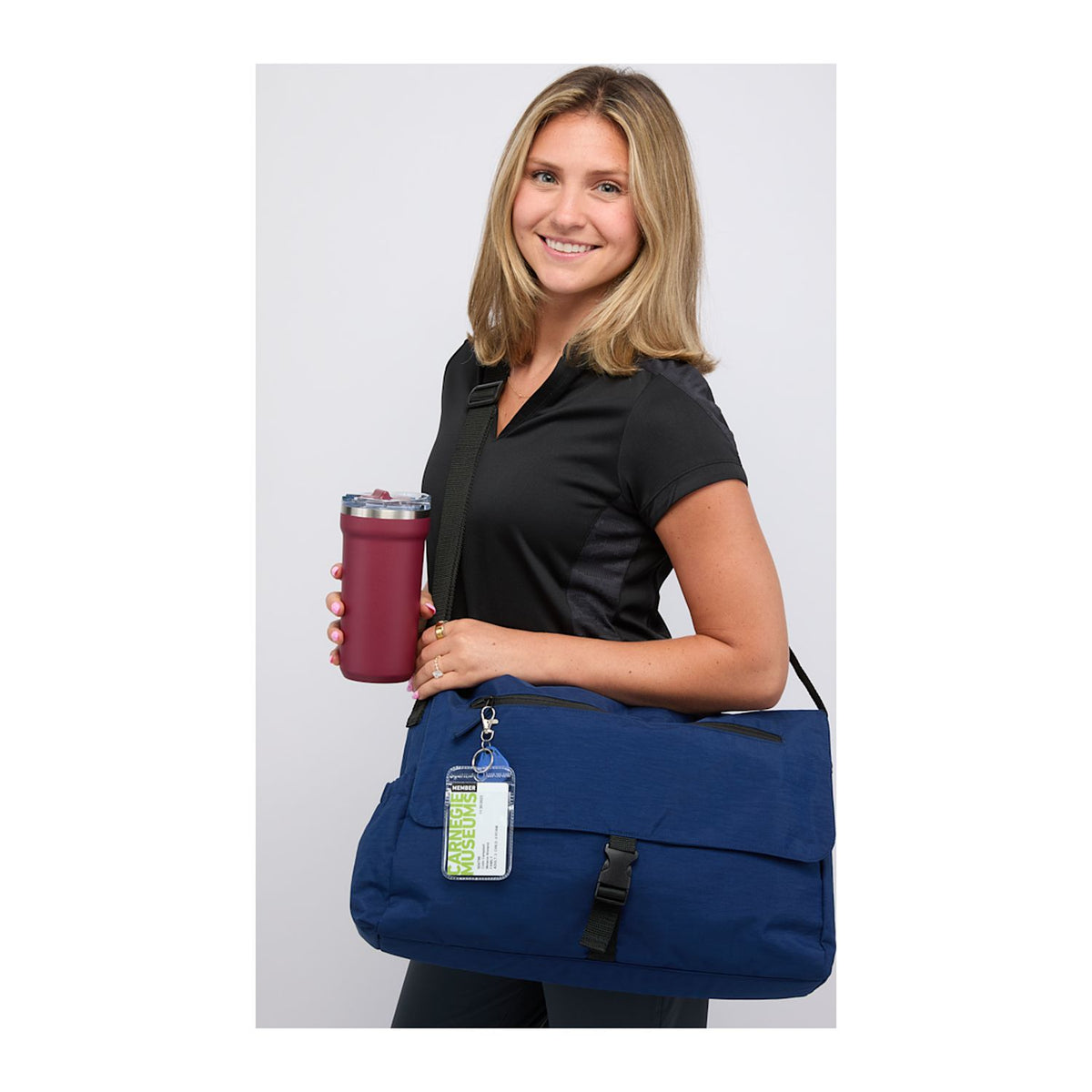 Person holding Avery 15" Computer Messenger Bag - Navy