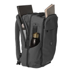 Gray backpack with compartments holding a laptop, notebook, and water bottle on a white background