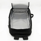 Black backpack with open lid on a white background
