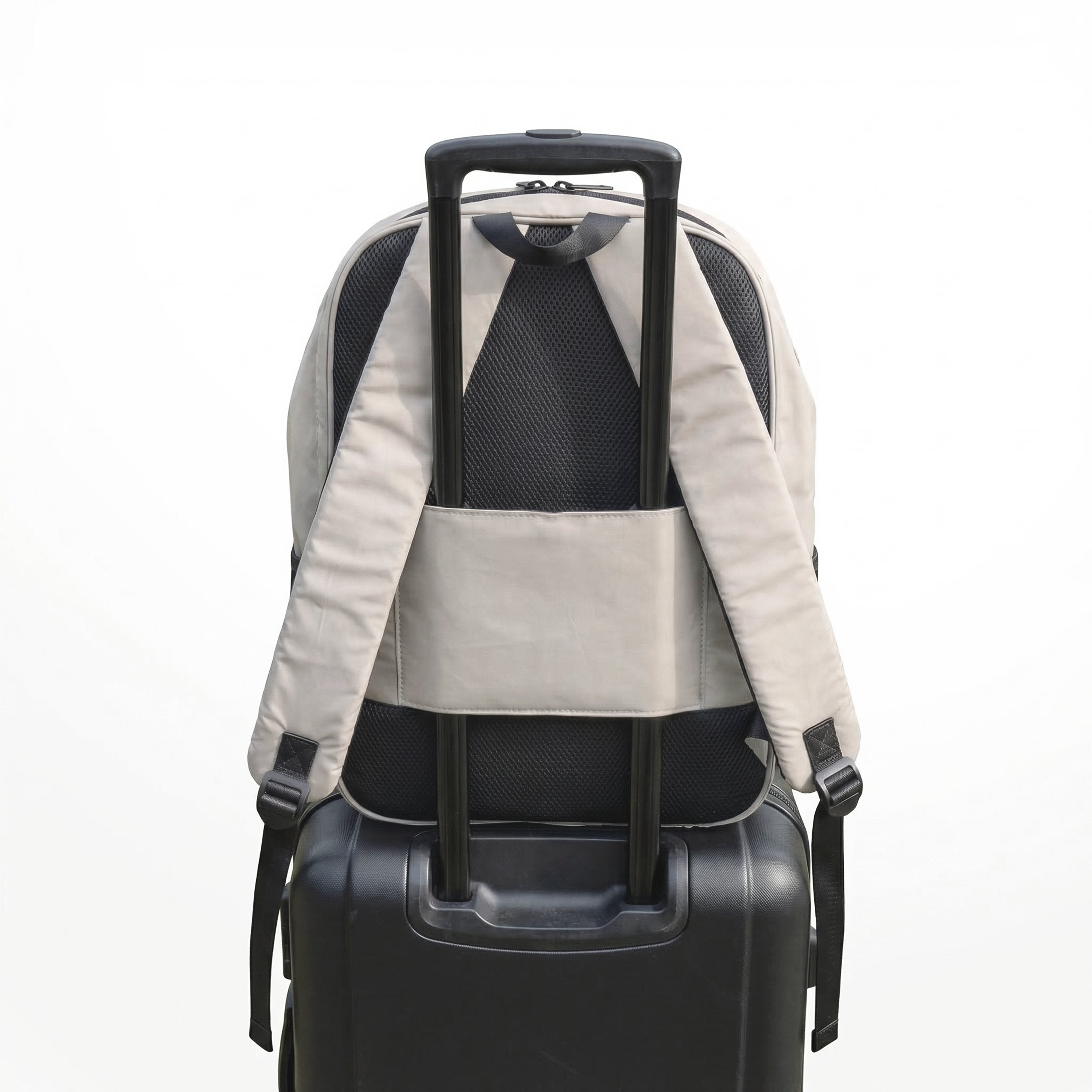 Backpack with a black suitcase on a white background