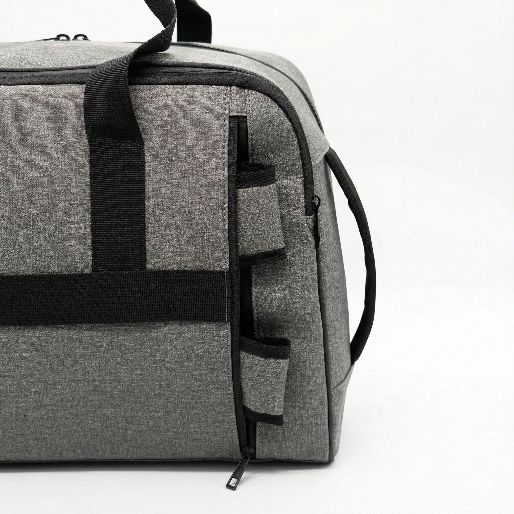 Vault Convertible Duffel Backpack closeup of straps hidden in zipper