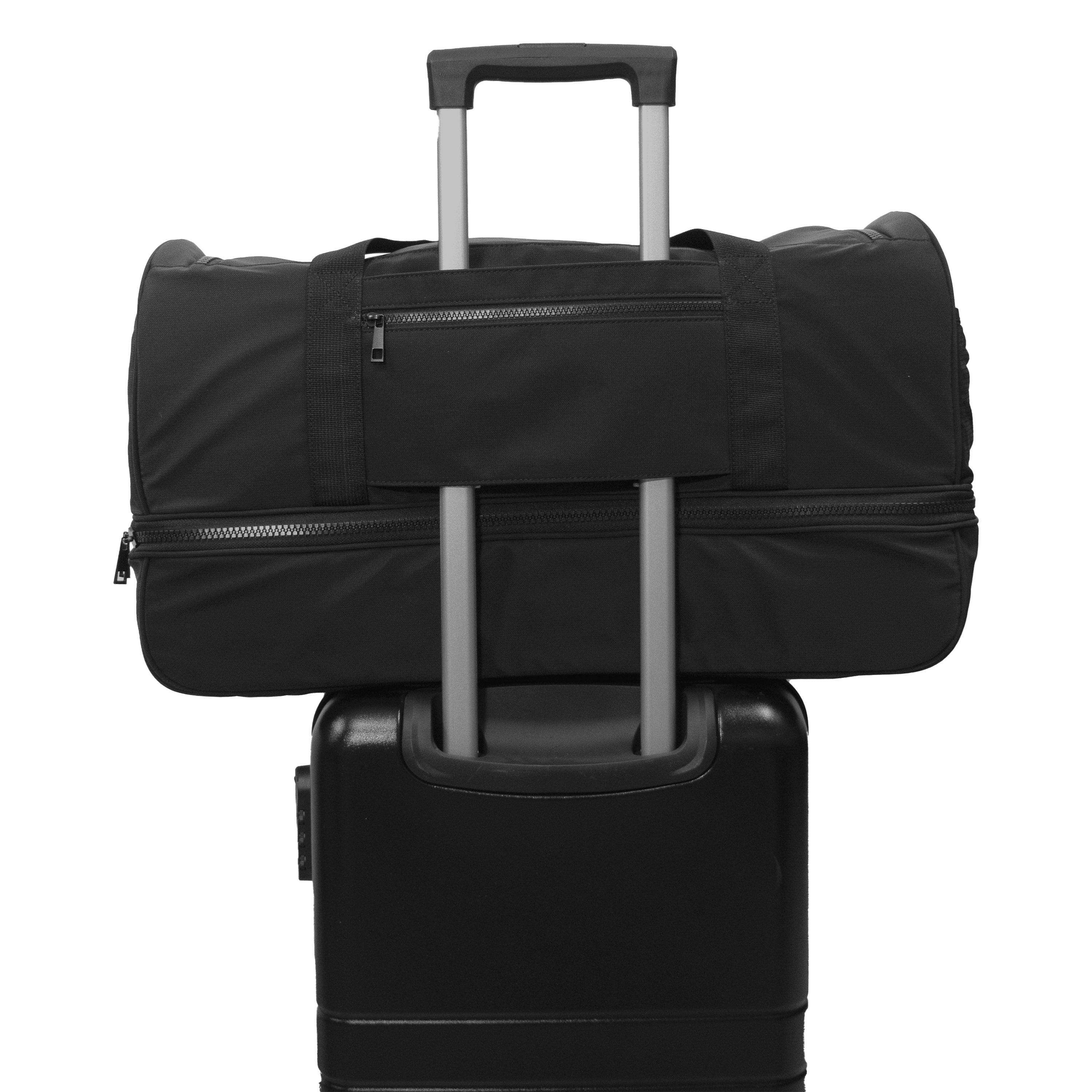 Node Shoe Compartment Duffel shown atop a luggage bag