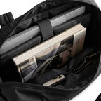 Interior of Zoom 17" Laptop Duffle shown holding a laptop, book and other accessories