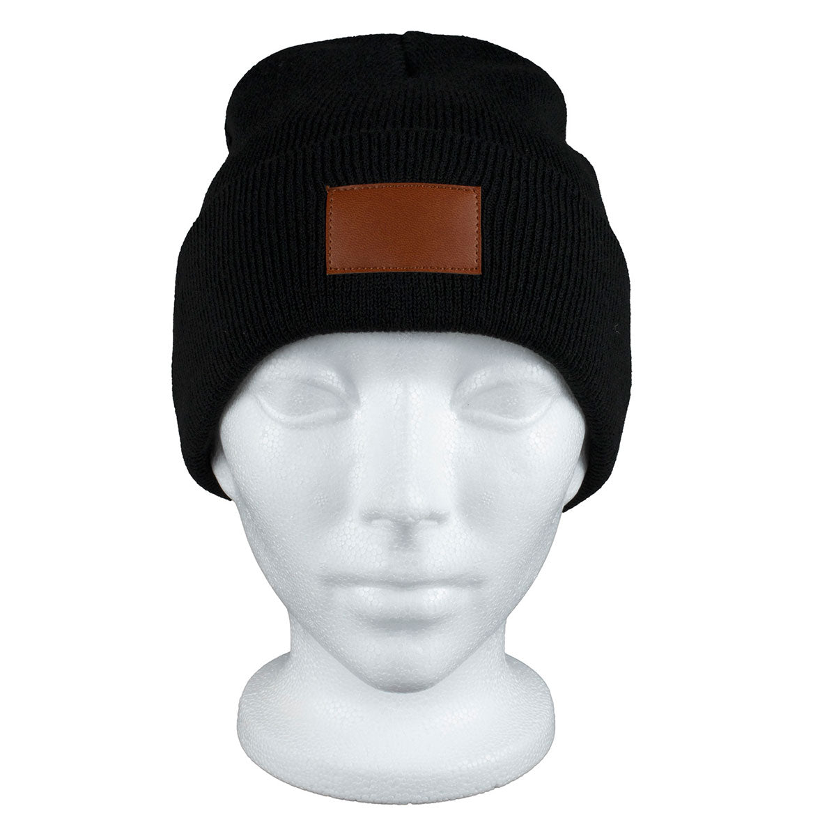 Black Tiburon Knit Cuffed Beanie with Patch shown on a manikin 