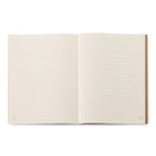 Open notebook with lined pages on a white background