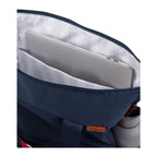 Navy blue backpack with a compartment holding a silver laptop on a white background