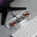 Custom Wireless Charger next to a keyboard and monitor.