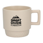 Beige mug with 'Great Divide Climbing Gym' logo on a white background