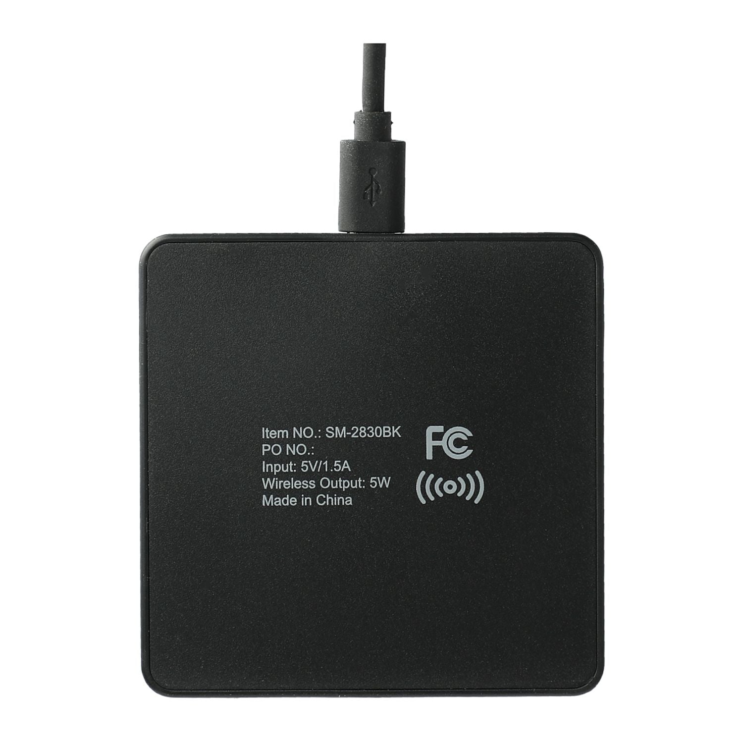 A black square wireless charging pad with a USB cable attached at the top, featuring white printed text and an FCC logo on the front, set against a plain white background.