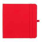 Red notebook with a strap on a white background