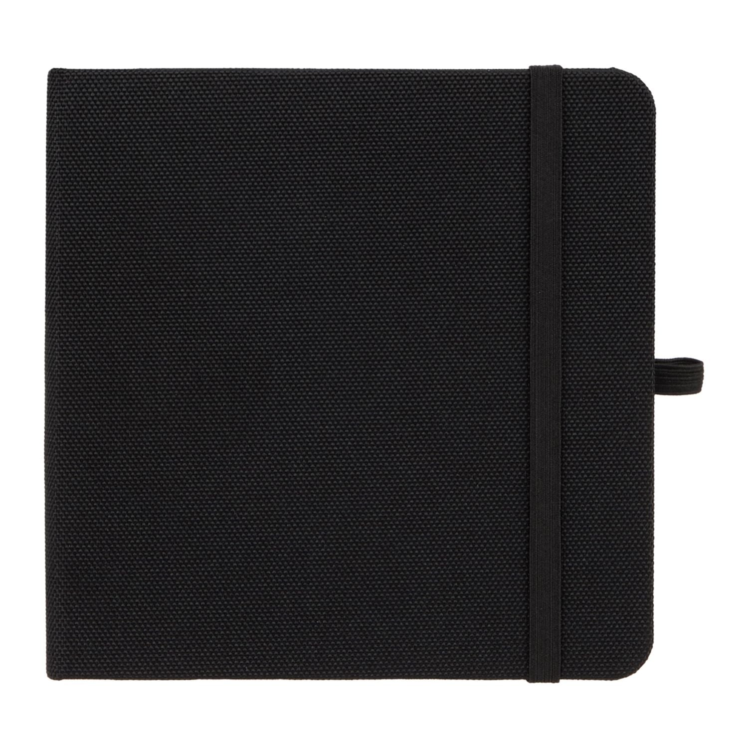 Black textured notebook with a strap closure on a white background