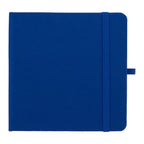 Blue notebook with a strap closure on a white background