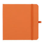Orange notebook with a textured cover on a white background