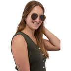 Stunkel Recycled Aviator Sunglasses shown on a woman's face