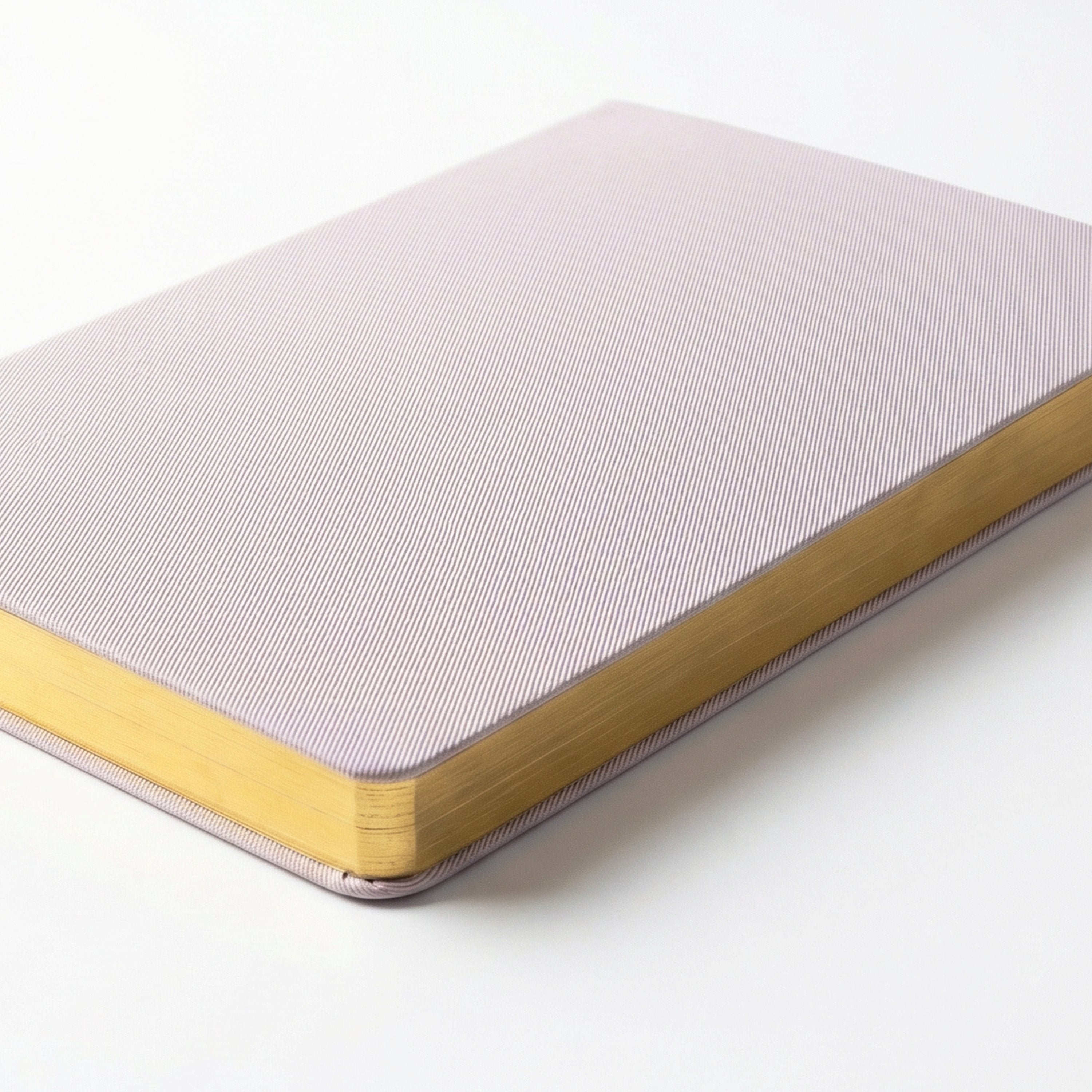 Notebook shown closed with pages showing the color of the binding