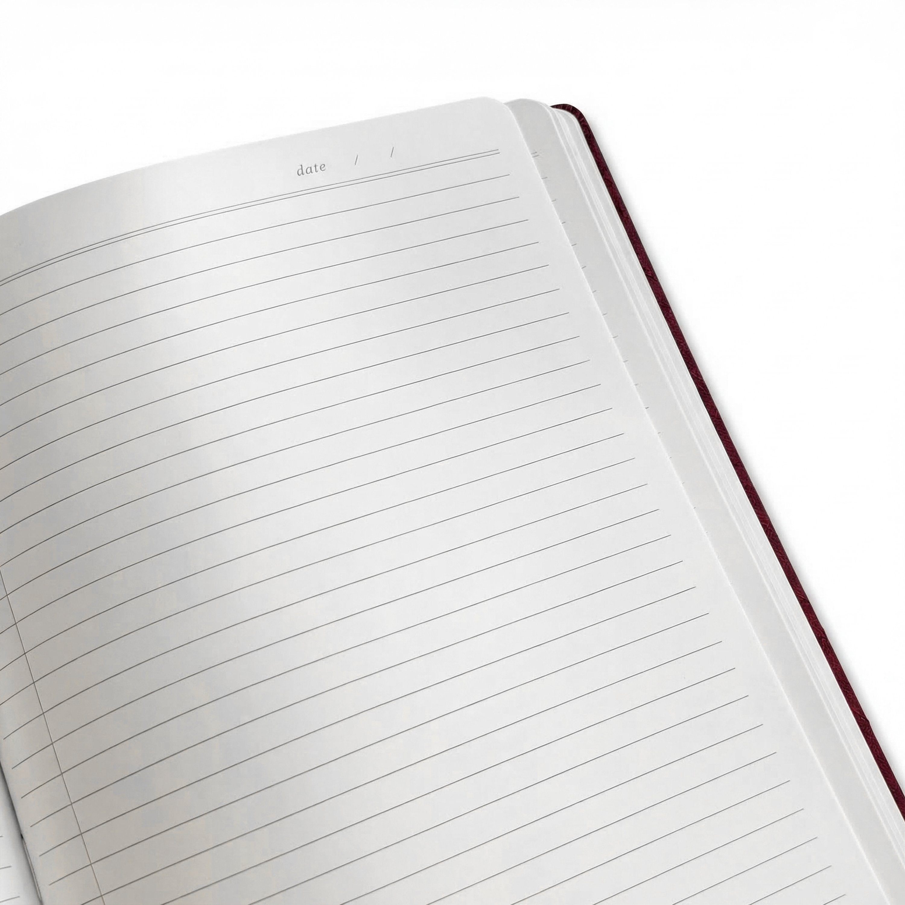 Open notebook with lined pages on a white background