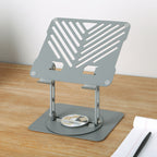 Gray adjustable laptop stand on a wooden surface with a white background