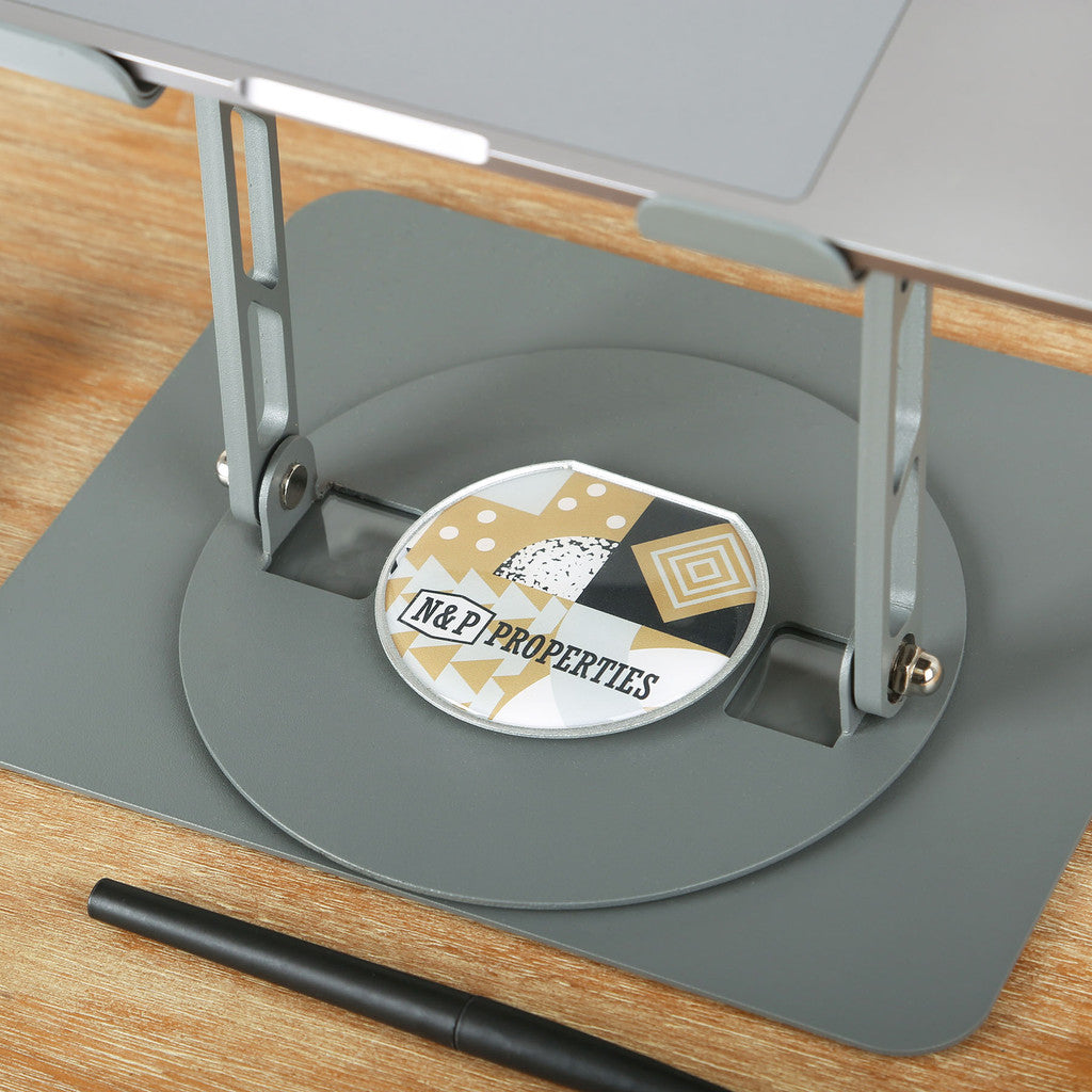 Gray metal stand with a custom logo at the base