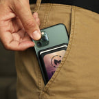 Snap2 Magnetic Wallet with Custom branding on a phone being put into a pocket 