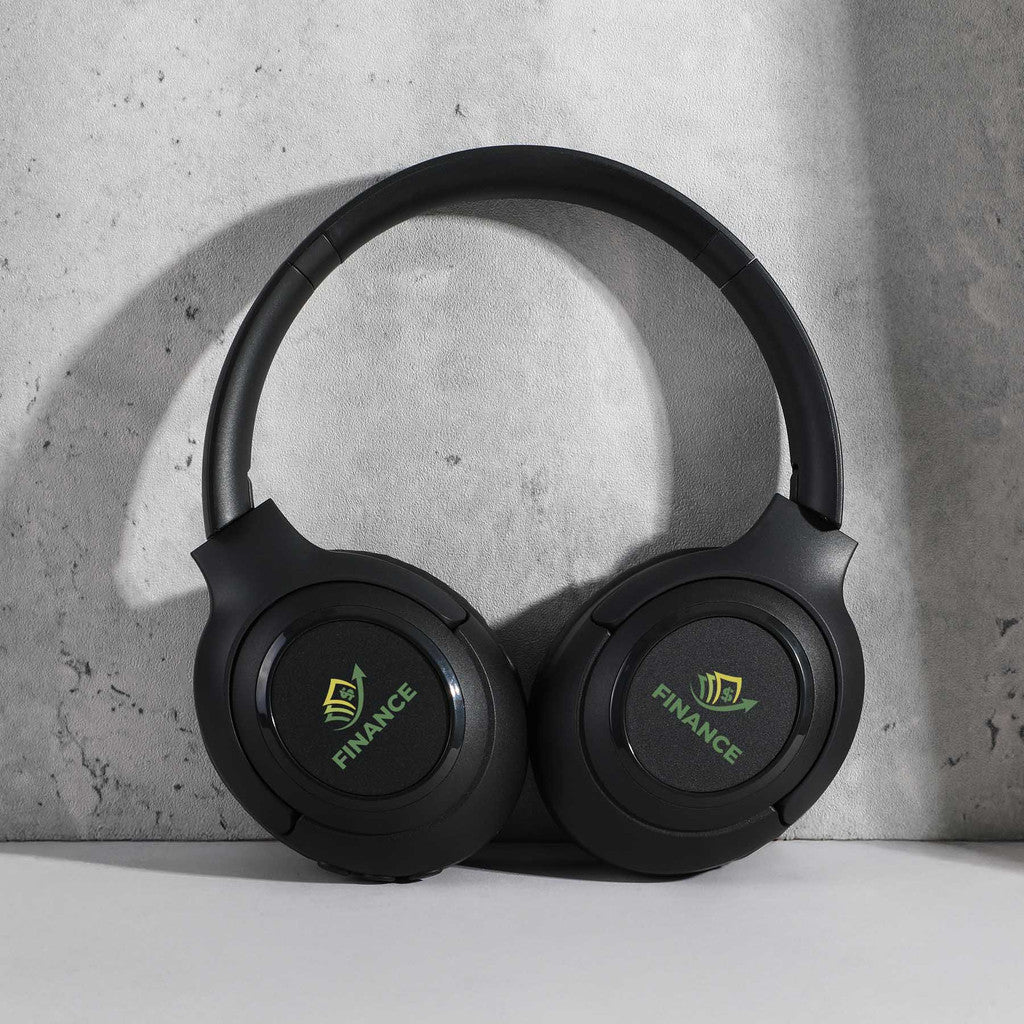 Sound Sharp Wireless Headphones with custom branding on a wall