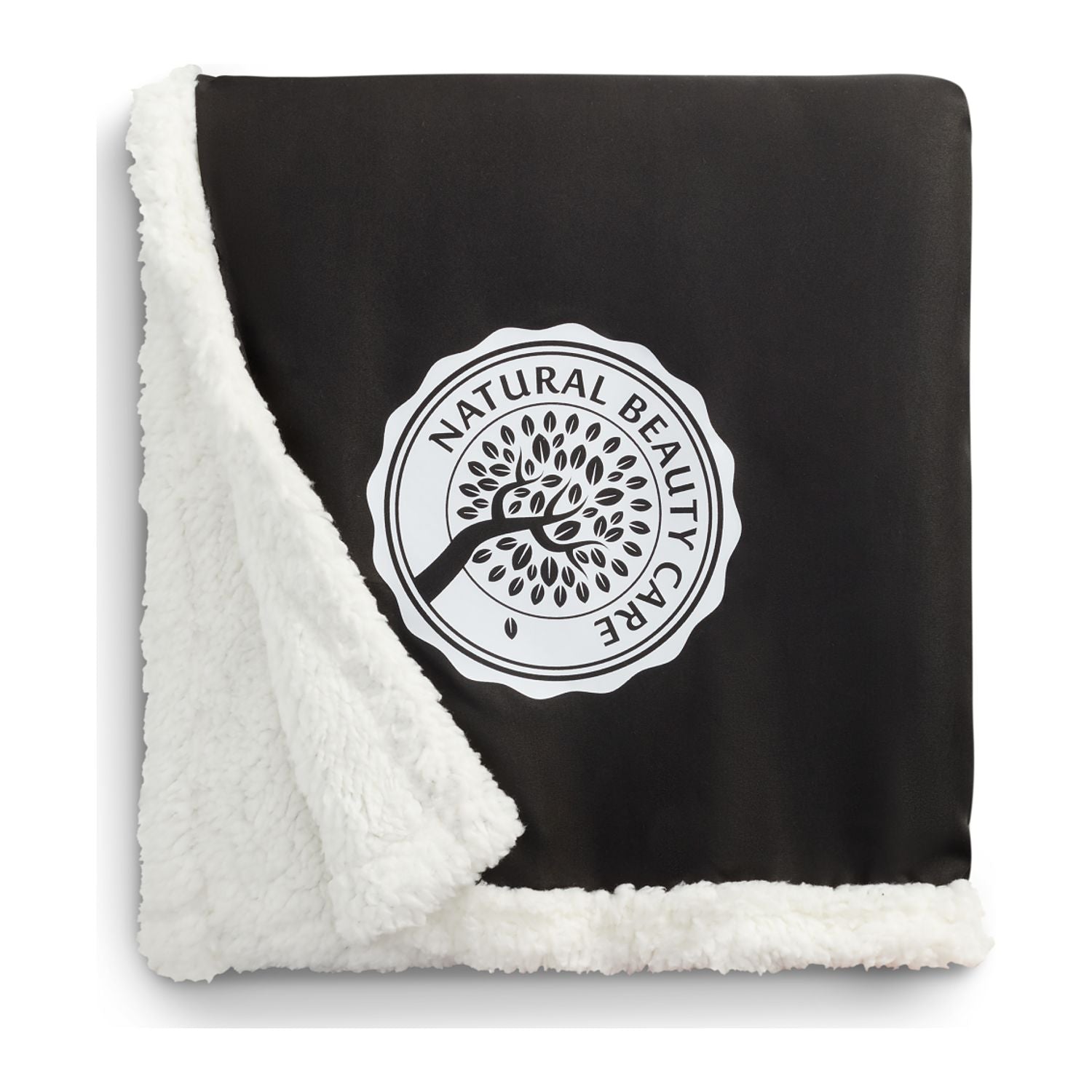 Black blanket with white sherpa lining and 'Natural Beauty Care' logo on a white background