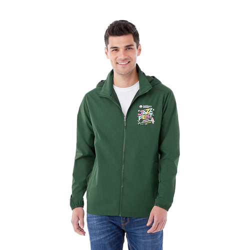 Man wearing a green Toba Packable Jacket with a logo on a white background